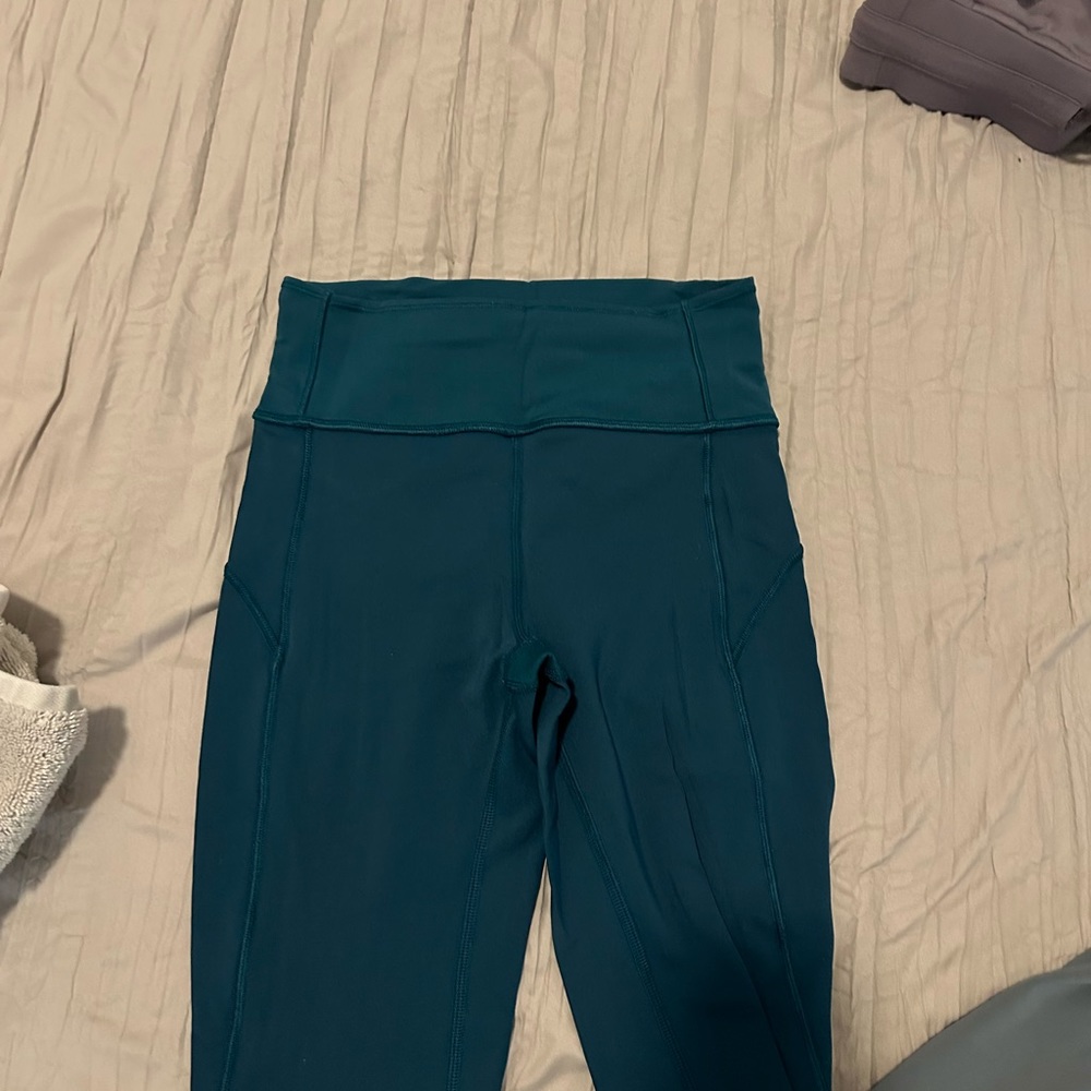 dark green lululemon wunder under 25” leggings